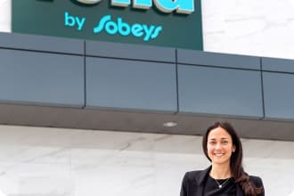 An image representing Sarah Joyce, Senior Vice President of E-commerce standing outside of the Voilà by Sobeys.