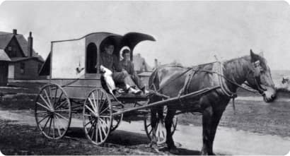 Image displaying J.W.Sobyes with horse drawn cart.