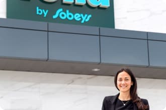 An image representing Sarah Joyce, Senior Vice President of E-commerce standing outside of the Voilà by Sobeys.